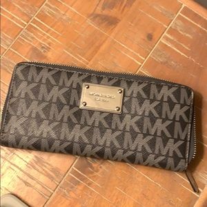 grey michael kors zip around large wallet/wristlet